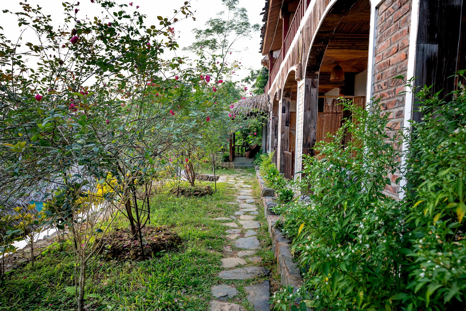 natural stone paving path outside of a house