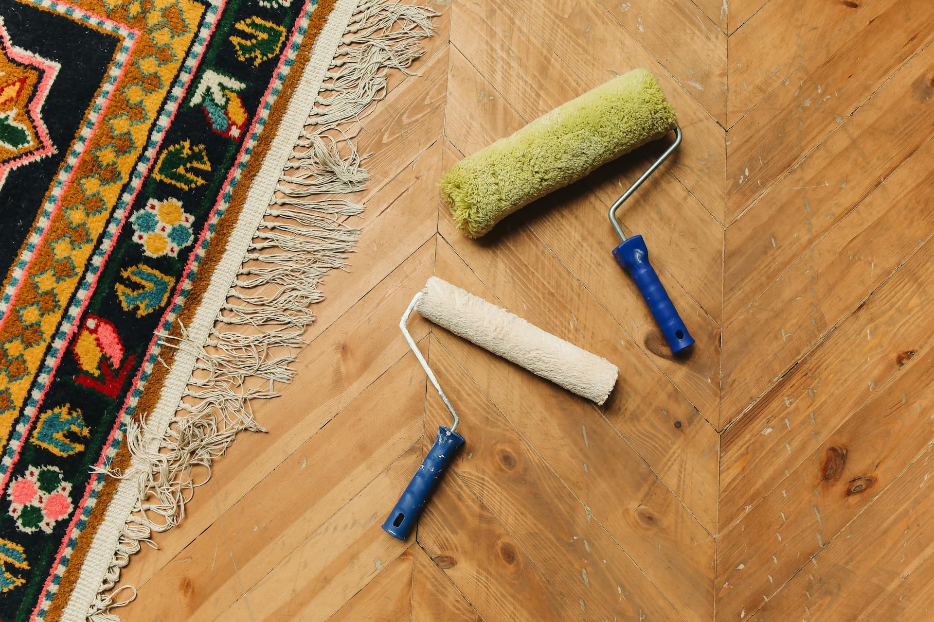 some redecorating tools on a hardwood floor